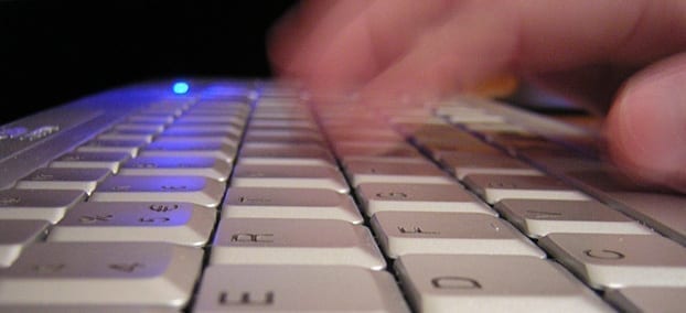 Image: Hands on keyboard. Keyword research and Keyword Analysis - NicheLabs Digital Marketing Company, Atlanta GA